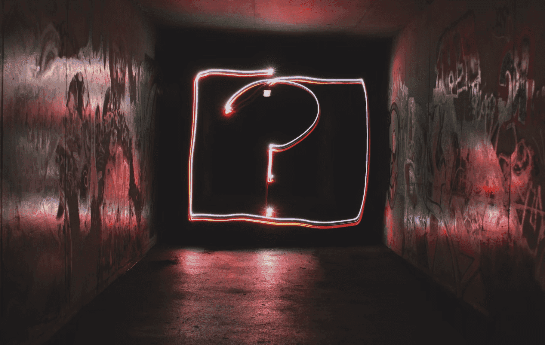 Question mark in a tunnel for mentor questions.