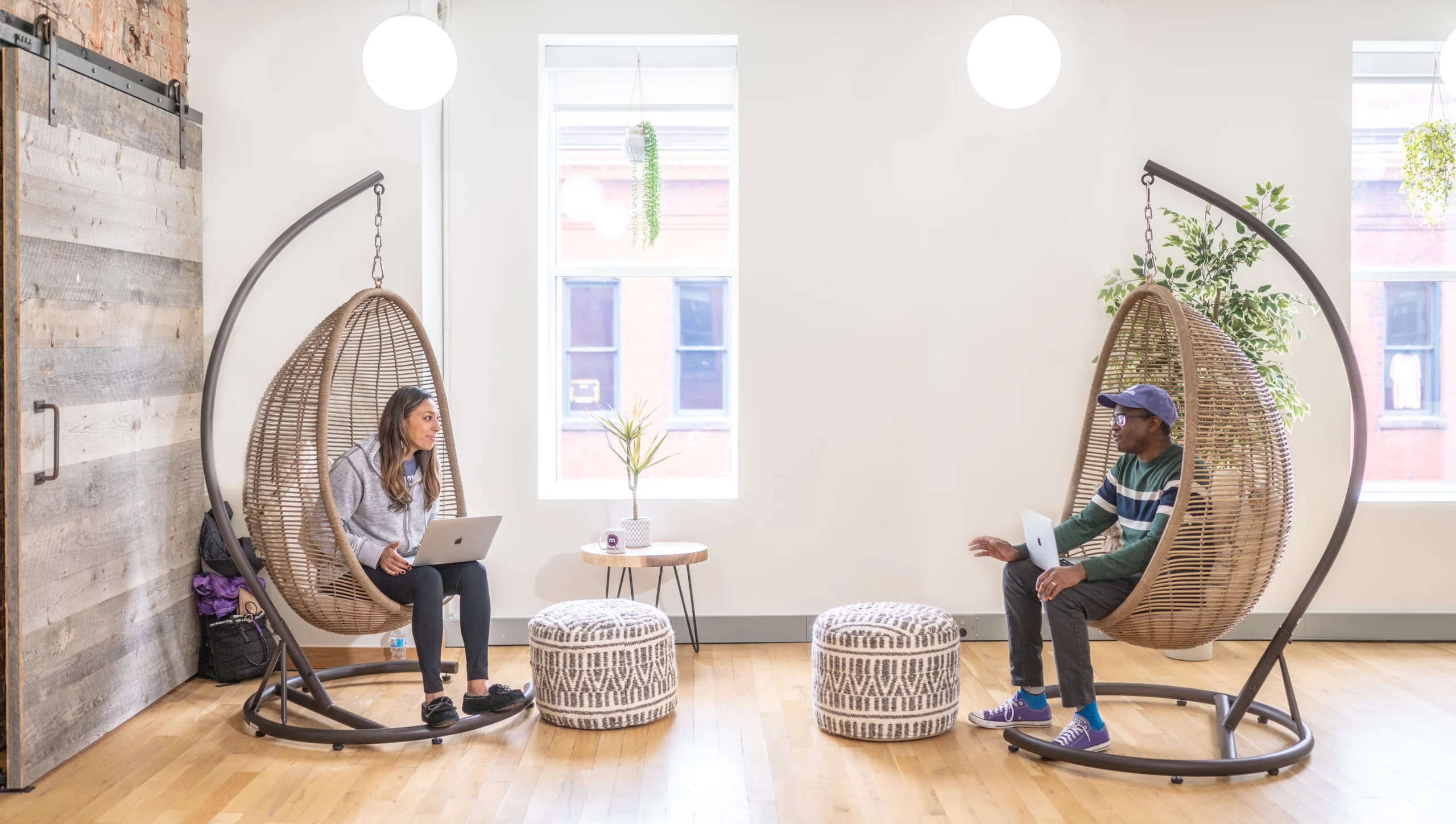 Hybrid @ MentorcliQ Through Home-Inspired Work Spaces 12 Mentorcliq hanging hammock chairs