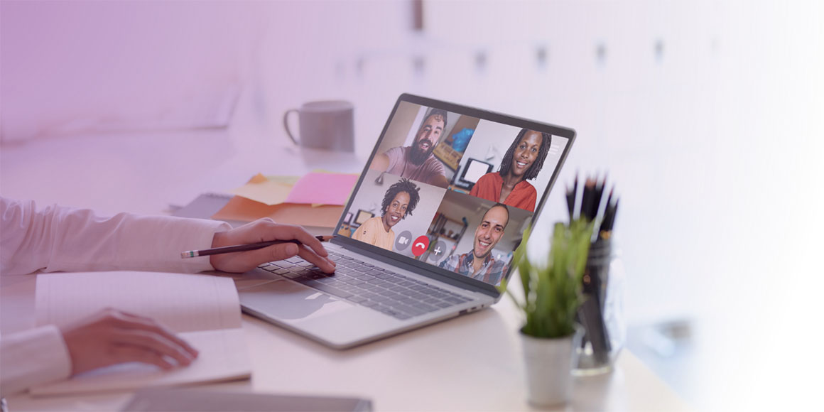 Laptop with a video conference call on screen