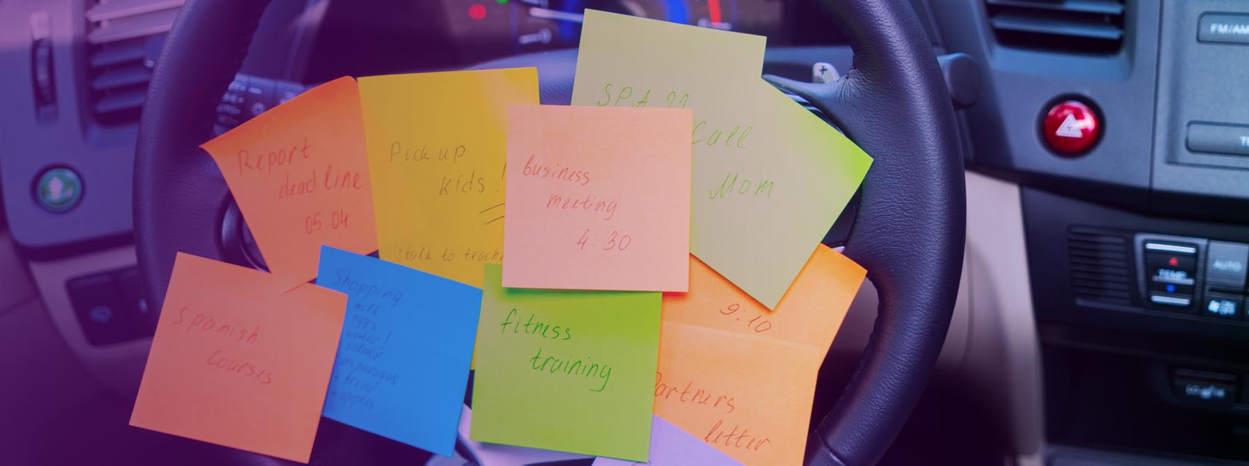 A variety of colorful sticky notes are attached to a car steering wheel, each with different handwritten reminders and tasks, illustrating a busy and multifaceted schedule. The vehicle's interior hints at a person managing their daily duties on the go.