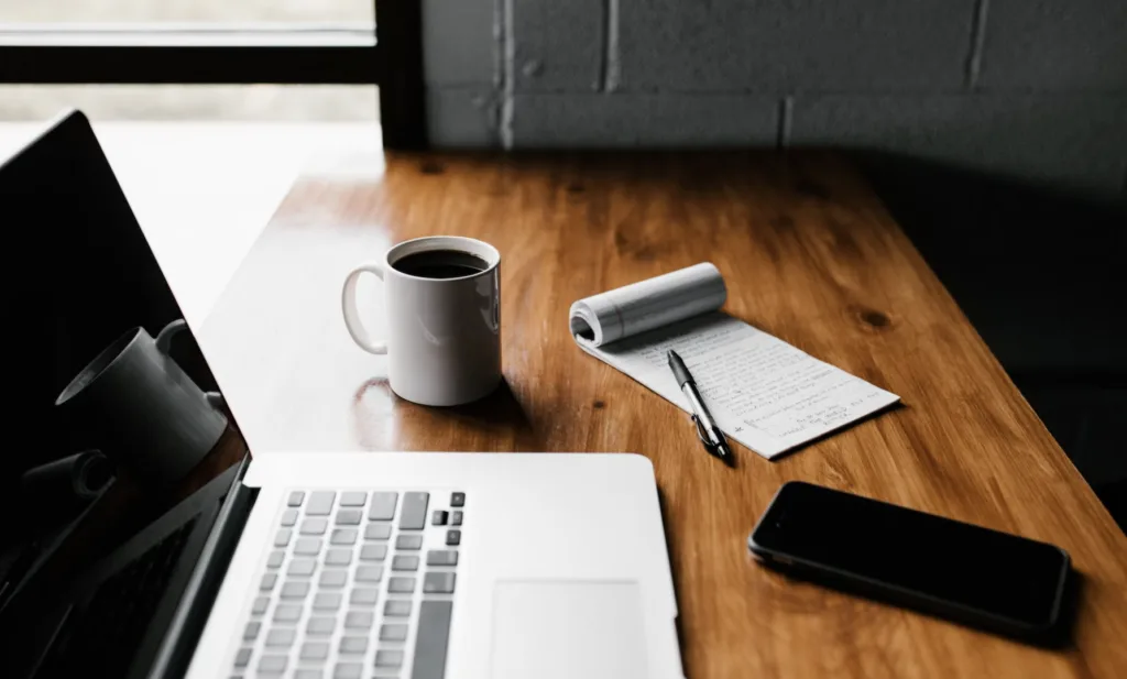 25 Questions to Ask a Mentor (and 5 Questions to Avoid) 5 Computer with notes to prepare to ask questions of mentor.