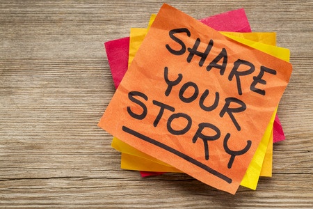 Share your story suggestion on a sticky note against grained wood